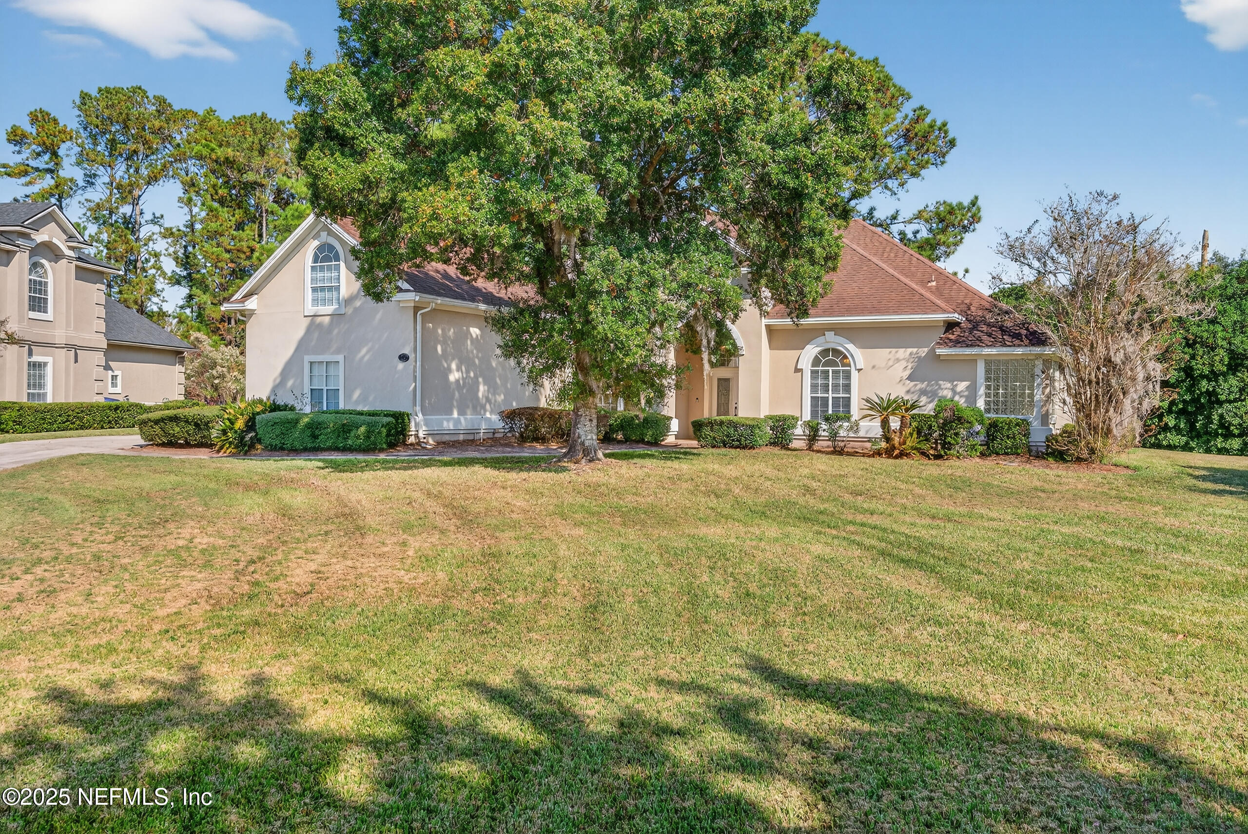 577 Hunters Grove Court Orange Park, FL 32073 - Photo 3 of 40 a front view of a house with a yard