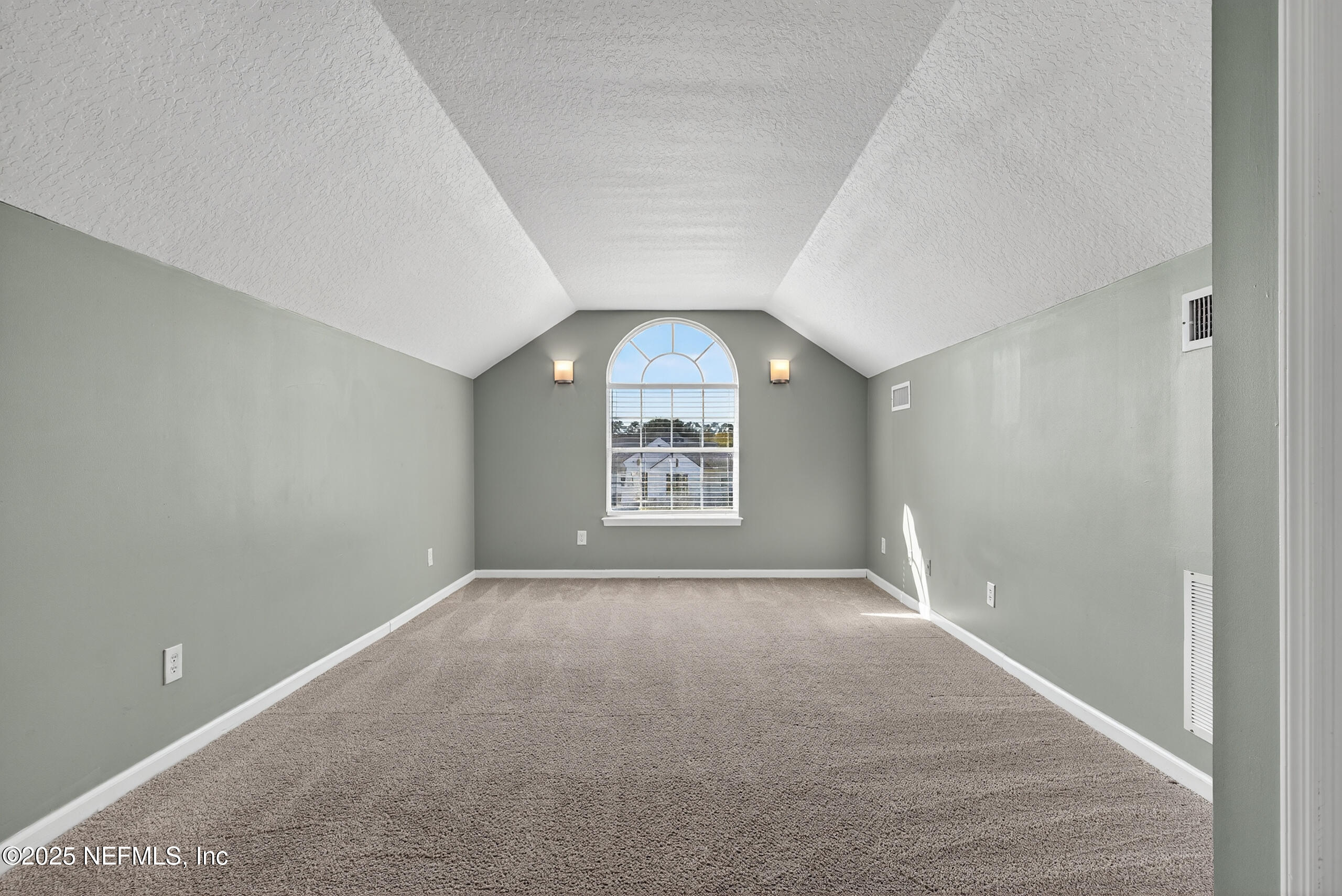 577 Hunters Grove Court Orange Park, FL 32073 - Photo 34 of 40 a view of a big room with windows and fireplace