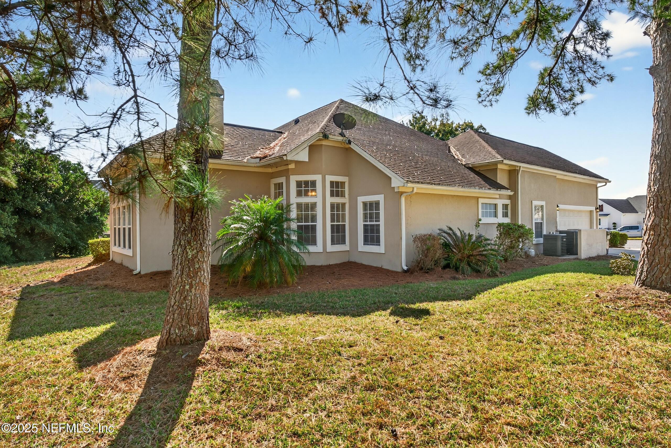 577 Hunters Grove Court Orange Park, FL 32073 - Photo 38 of 40 a front view of a house with garden