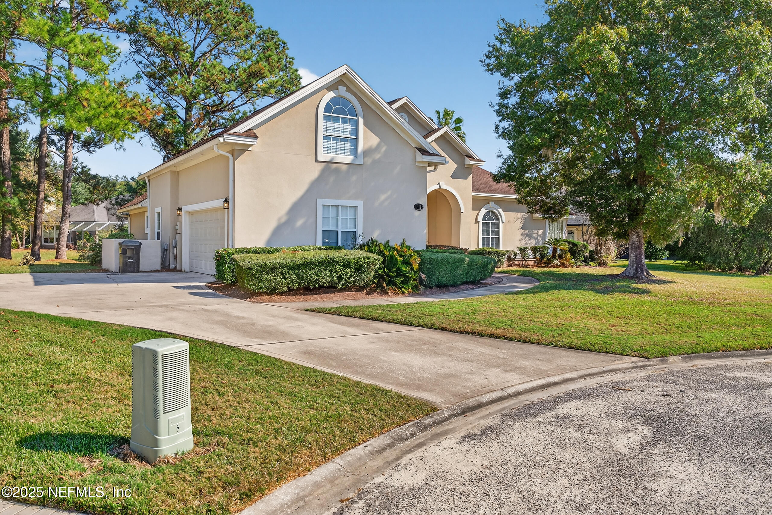577 Hunters Grove Court Orange Park, FL 32073 - Photo 4 of 40 a front view of a house with a yard