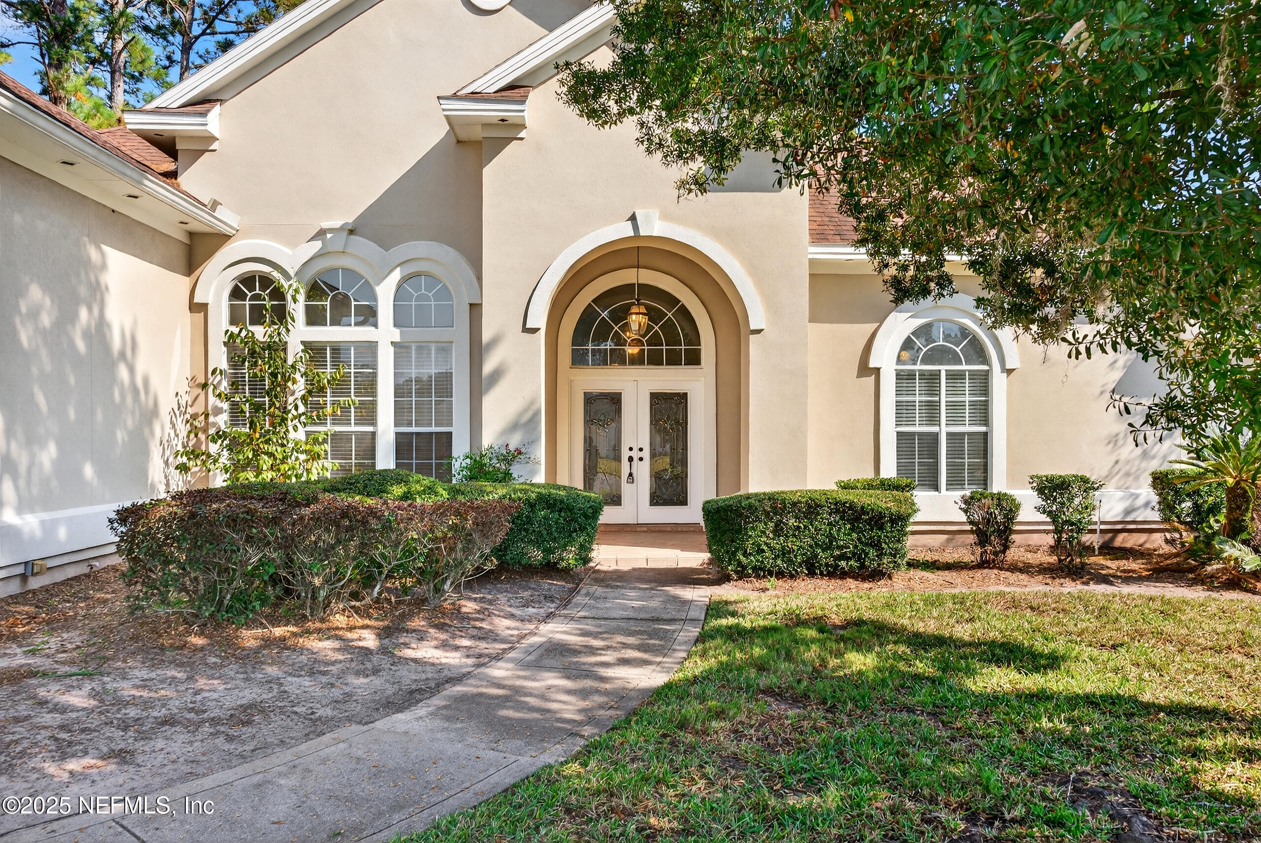 577 Hunters Grove Court Orange Park, FL 32073 - Photo 5 of 40 a front view of a house with garden