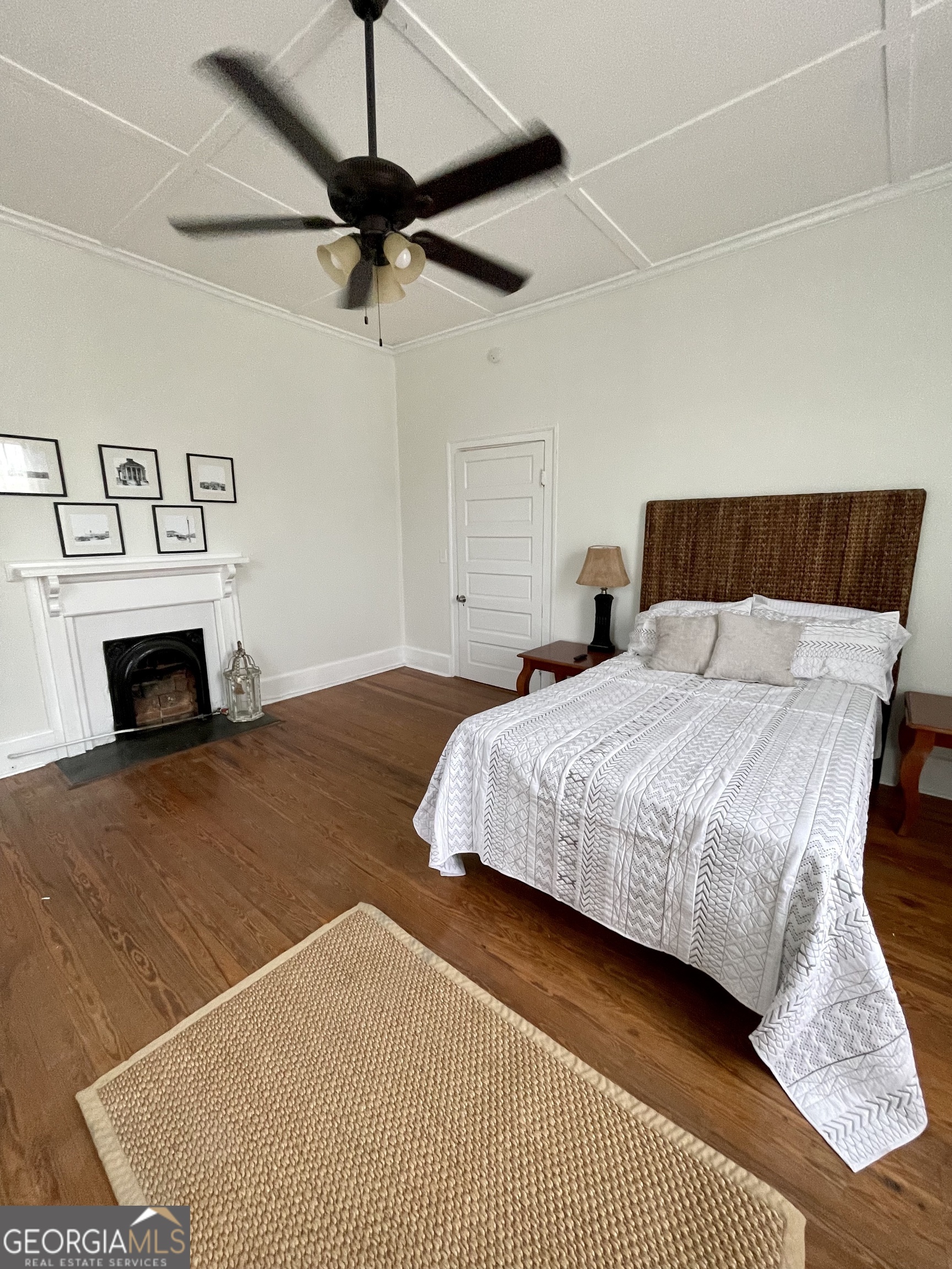 400 West Gordon Street Thomaston, GA 30286 - Photo 23 of 43 a bedroom with a bed and a fireplace