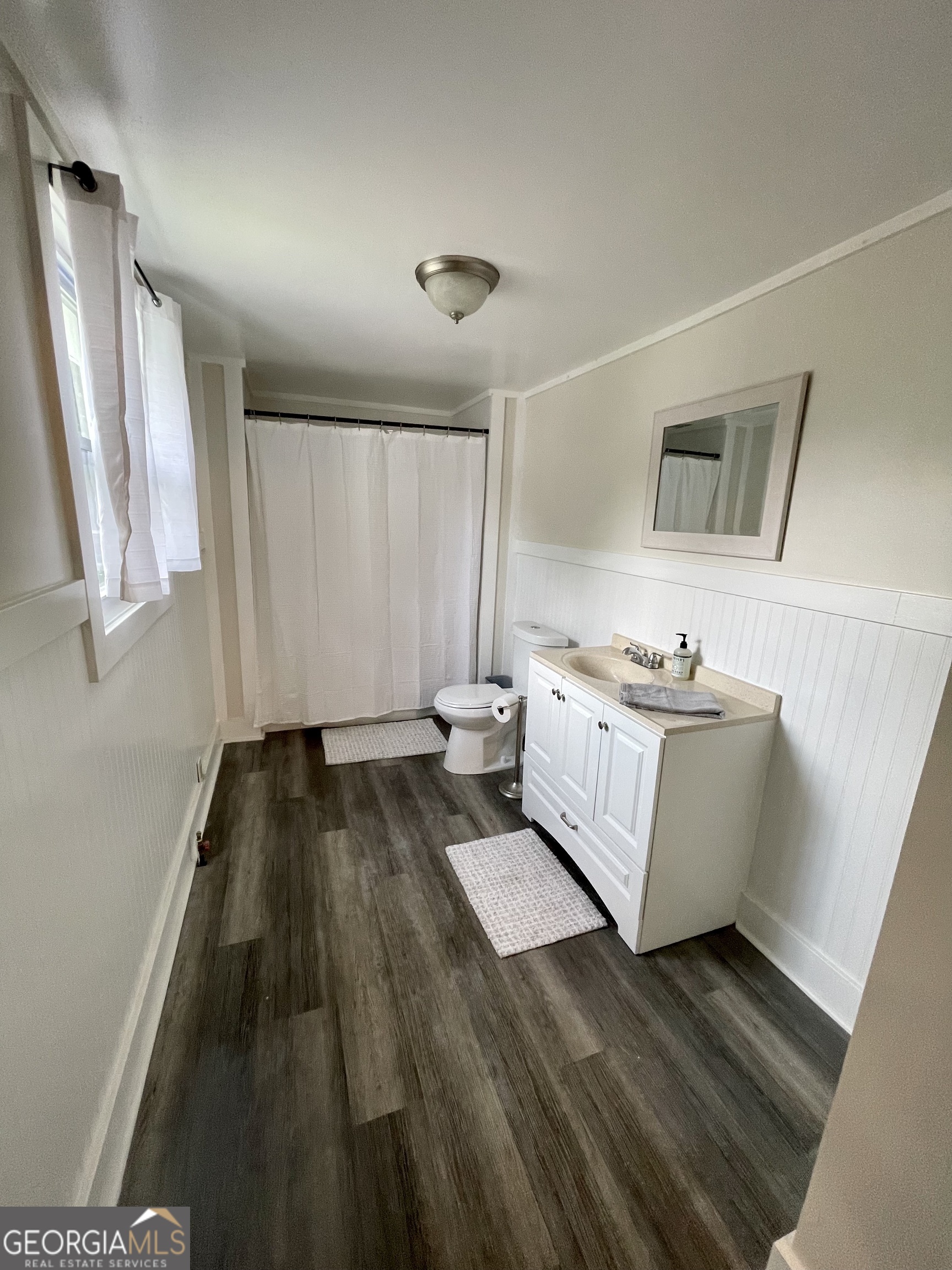 400 West Gordon Street Thomaston, GA 30286 - Photo 31 of 43 a living room with furniture and a rug