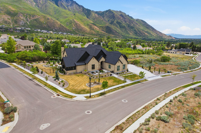 1817 North Dean Court, Unit 12 Alpine, UT 84004 - Photo 33 of 38 Stone-clad residence featuring a dark shingle roof and a corner lot