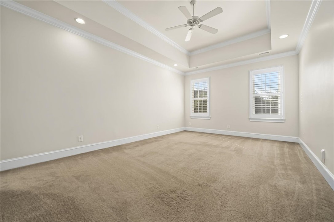 38 Angus Run Seneca, SC 29672 - Photo 28 of 46 This spacious bedroom offers ample natural light and a comfortable ambiance.