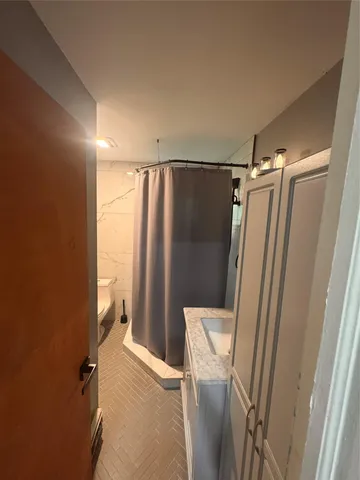 a view of a room with rack on the wall