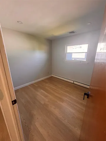 a kitchen with stainless steel appliances a refrigerator and a stove