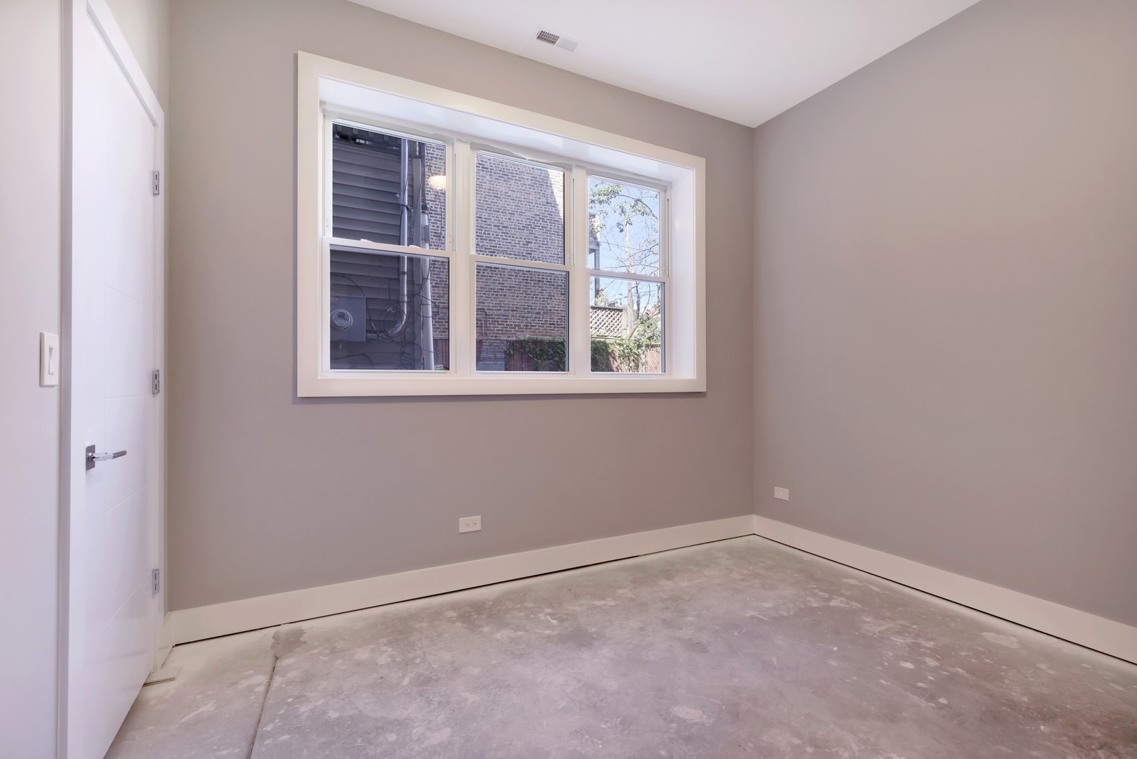 1732 West 19th Street, Unit 1 Chicago, IL 60608 - Photo 13 of 17 an empty room with a window