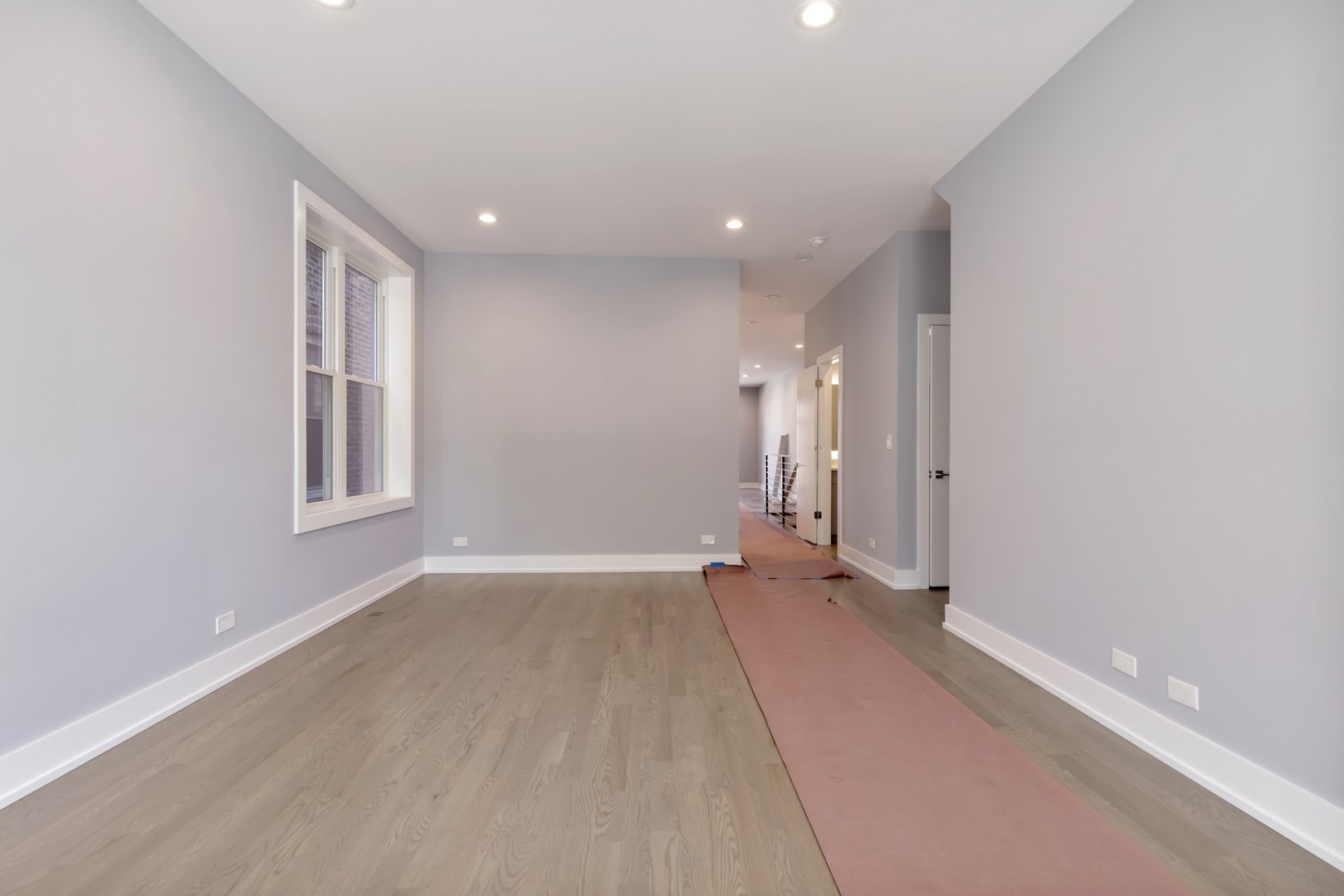 1732 West 19th Street, Unit 1 Chicago, IL 60608 - Photo 3 of 17 a view of an empty room with a window