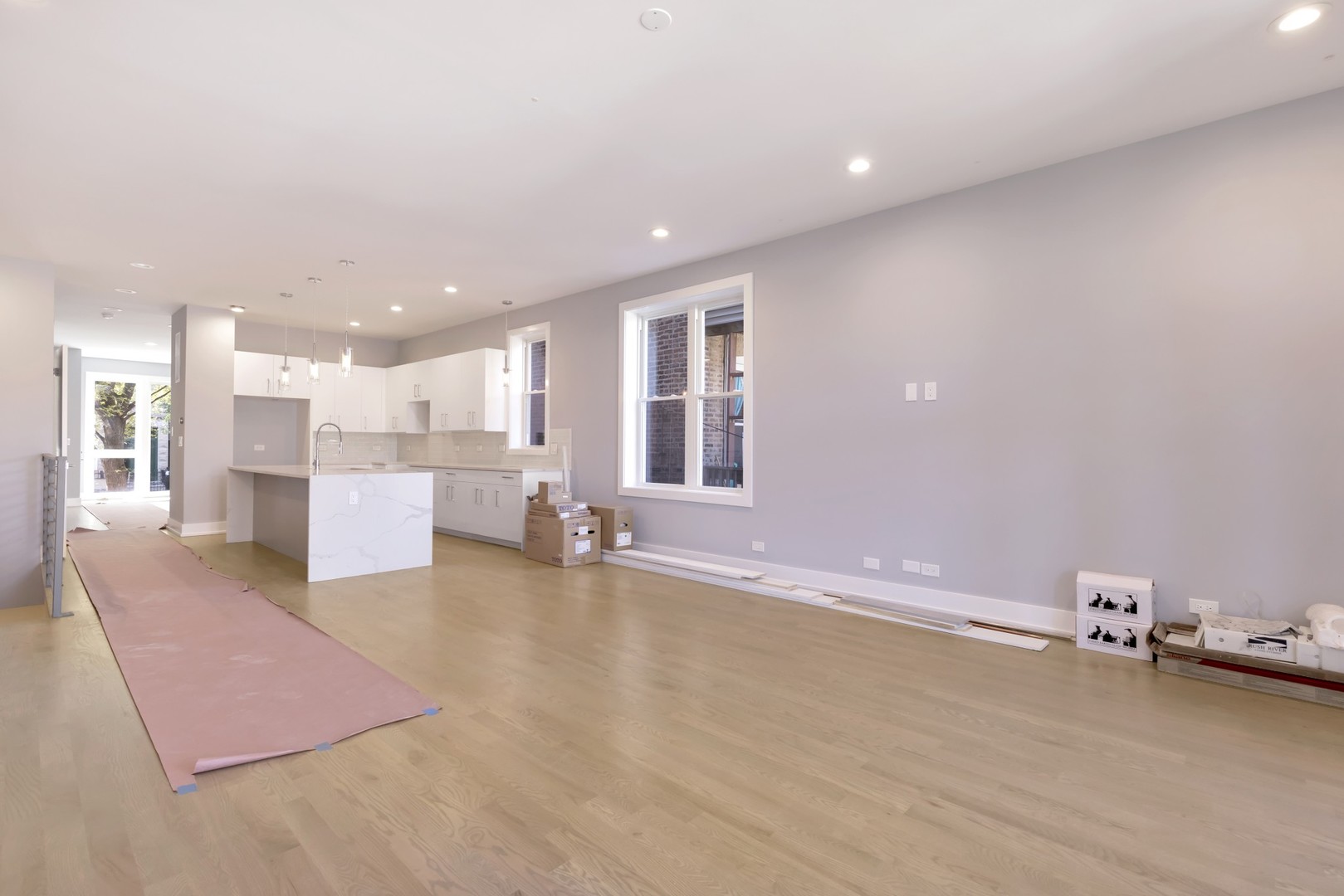 1732 West 19th Street, Unit 1 Chicago, IL 60608 - Photo 6 of 17 a view of a livingroom with a kitchen