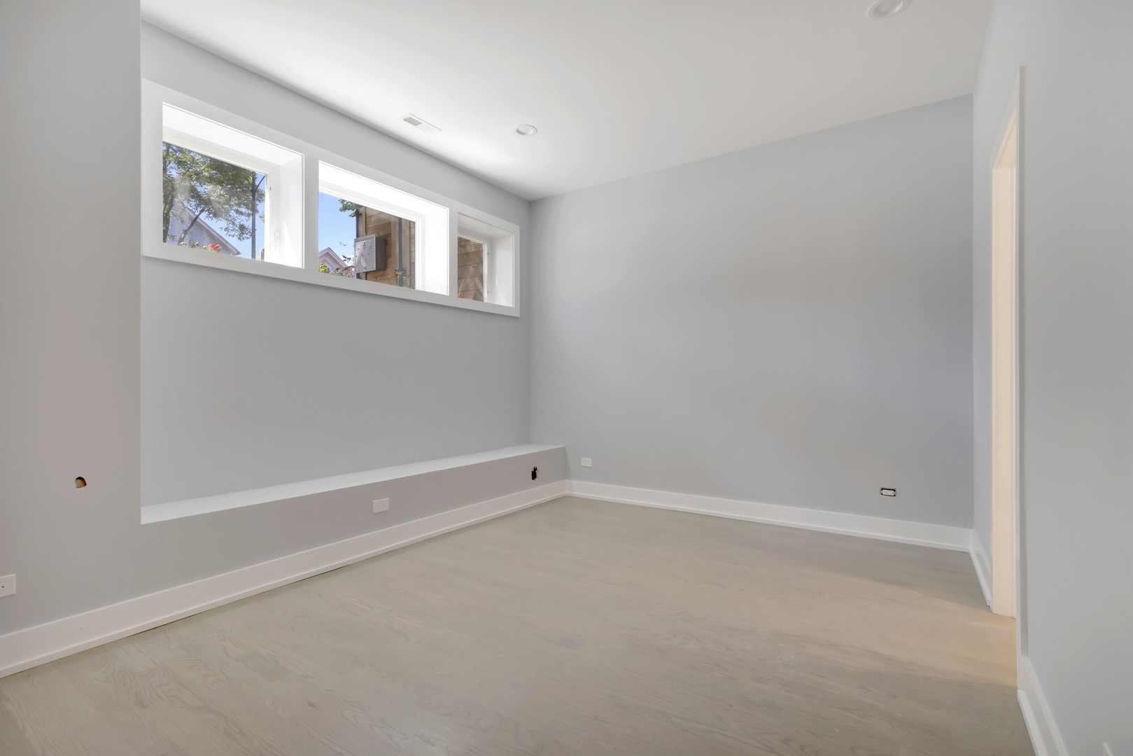 1732 West 19th Street, Unit 1 Chicago, IL 60608 - Photo 9 of 17 a view of an empty room with a window