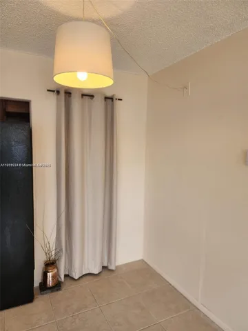 a view of entryway with chandelier