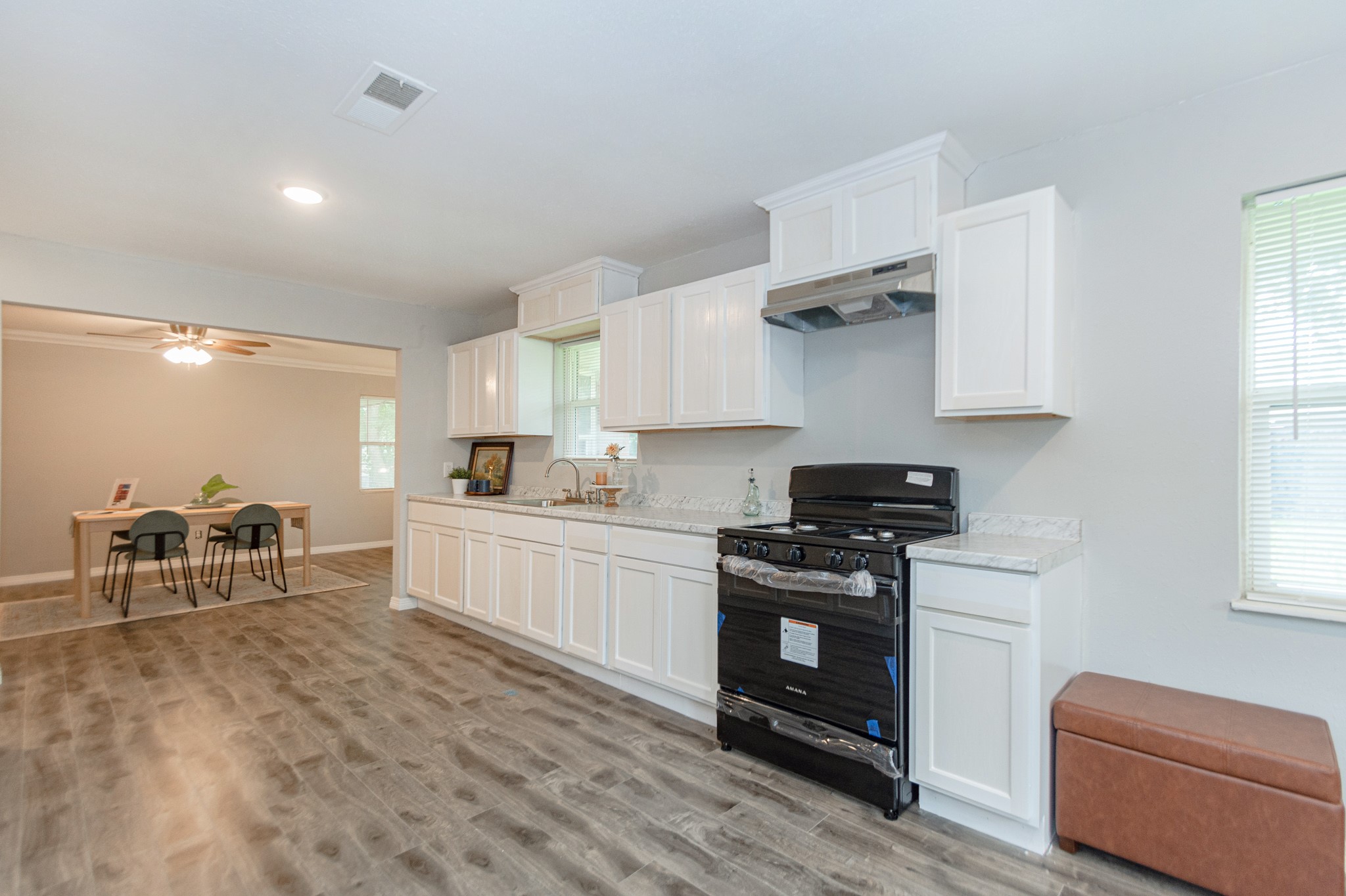 2002 Nottingham Street Pasadena, TX 77502 - Photo 2 of 33 a kitchen with stainless steel appliances granite countertop a stove and a refrigerator