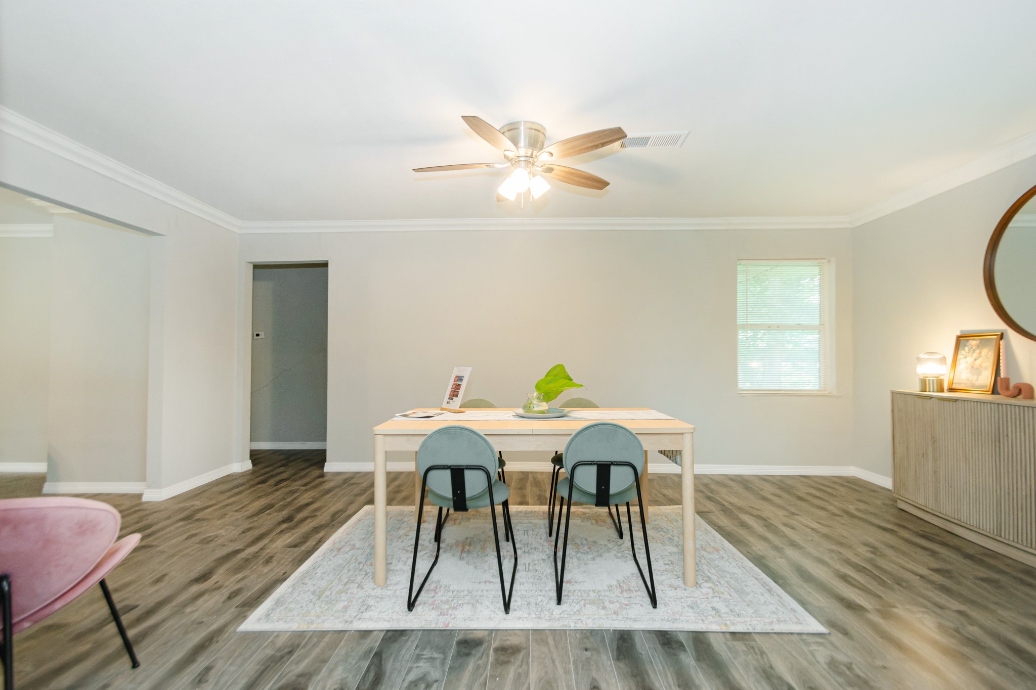 2002 Nottingham Street Pasadena, TX 77502 - Photo 22 of 33 a view of a dining room with furniture and wooden floor