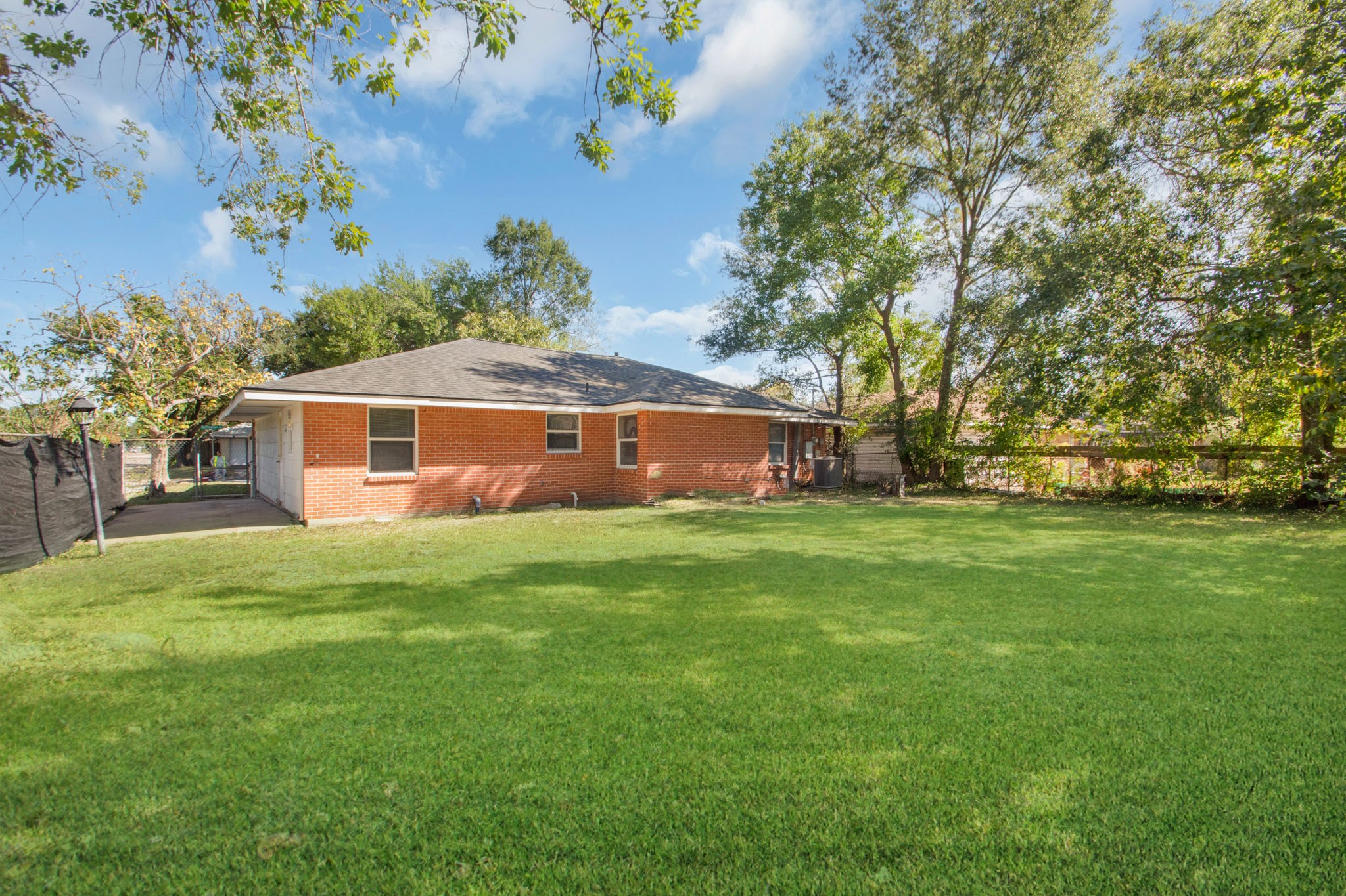 2002 Nottingham Street Pasadena, TX 77502 - Photo 30 of 33 a front view of a house with a garden