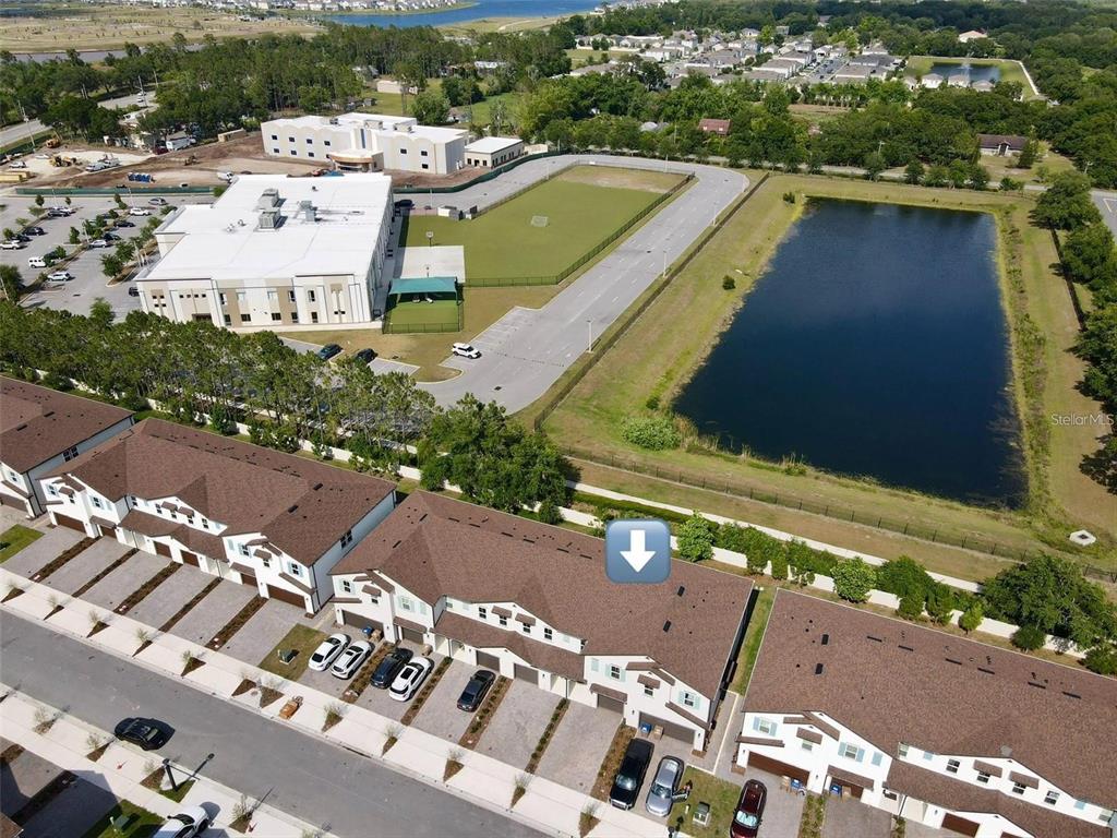 4561 Small Creek Road Kissimmee, FL 34744 - Photo 2 of 32 a view of a city with tall buildings