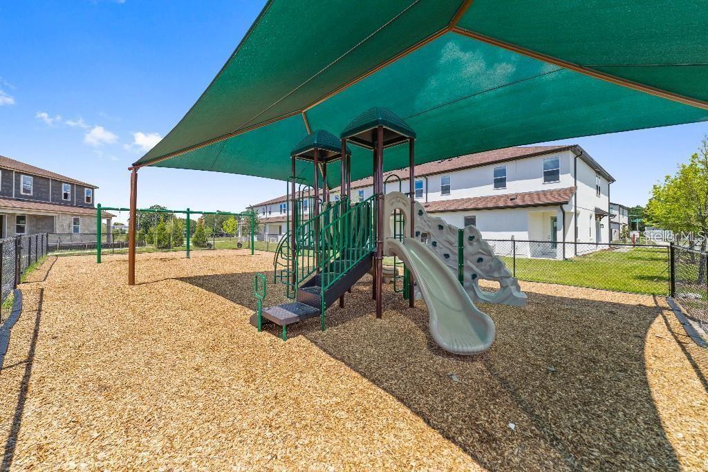 4561 Small Creek Road Kissimmee, FL 34744 - Photo 32 of 32 a view of a park with slide