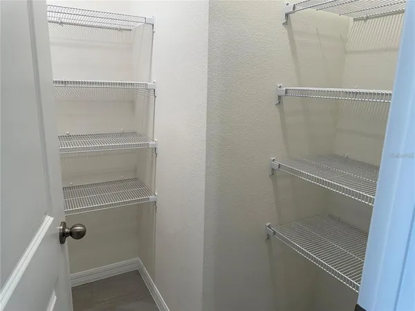 a bathroom with a glass door shower