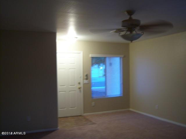 12205 West Larkspur Road El Mirage, AZ 85335 - Photo 2 of 6 LARKSPUR FRONT ROOM