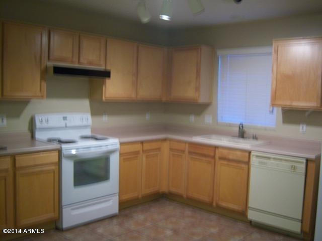 12205 West Larkspur Road El Mirage, AZ 85335 - Photo 5 of 6 LARKSPUR KITCHEN 2