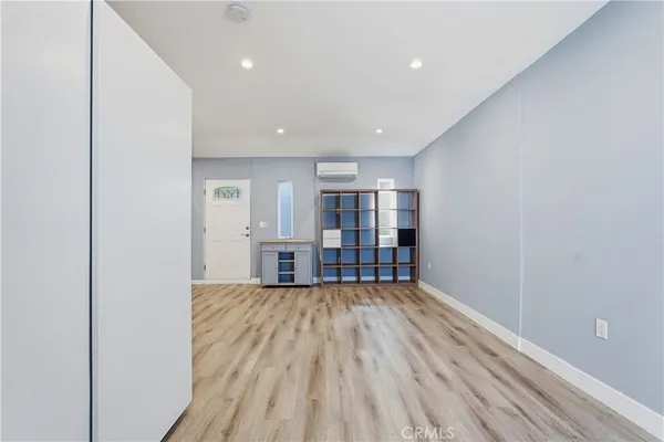 a kitchen with stainless steel appliances a refrigerator and a oven