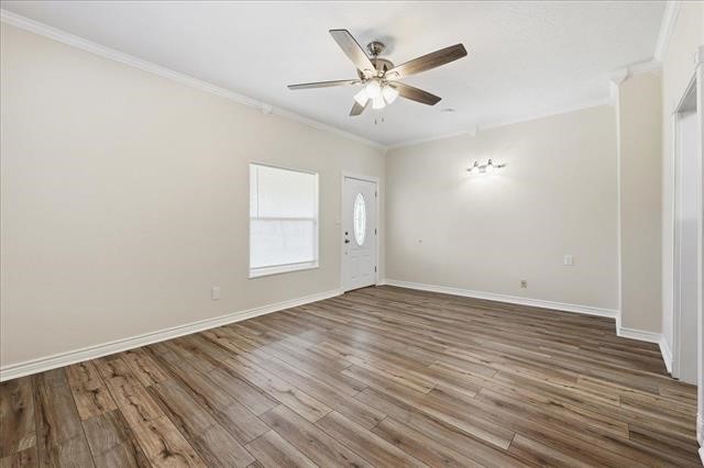6309 32nd Street Groves, TX 77619 - Photo 17 of 34 wooden floor in an empty room