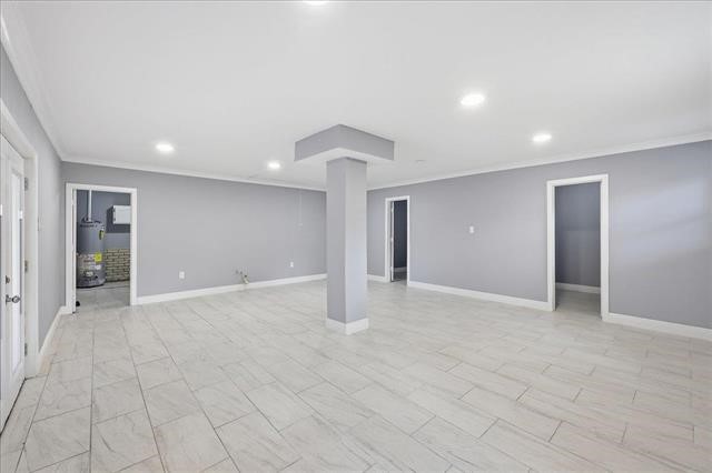6309 32nd Street Groves, TX 77619 - Photo 22 of 34 a view of an empty room with wooden floor