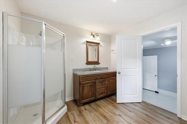 6309 32nd Street Groves, TX 77619 - Photo 26 of 34 a room that has a mirror and a sink in it