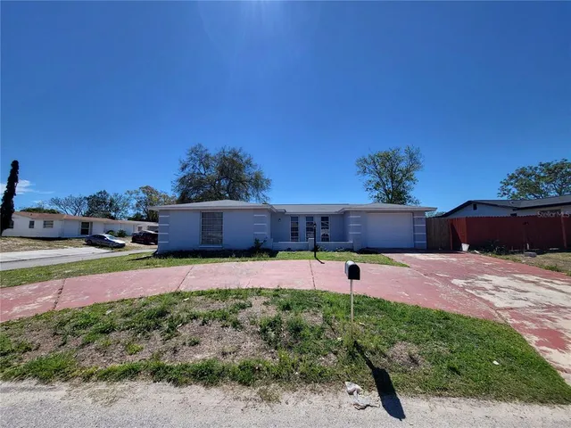 a view of a backyard of a house