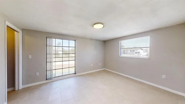 an empty room with windows