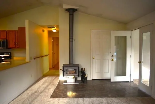 a view of a bathroom with a tub and shower