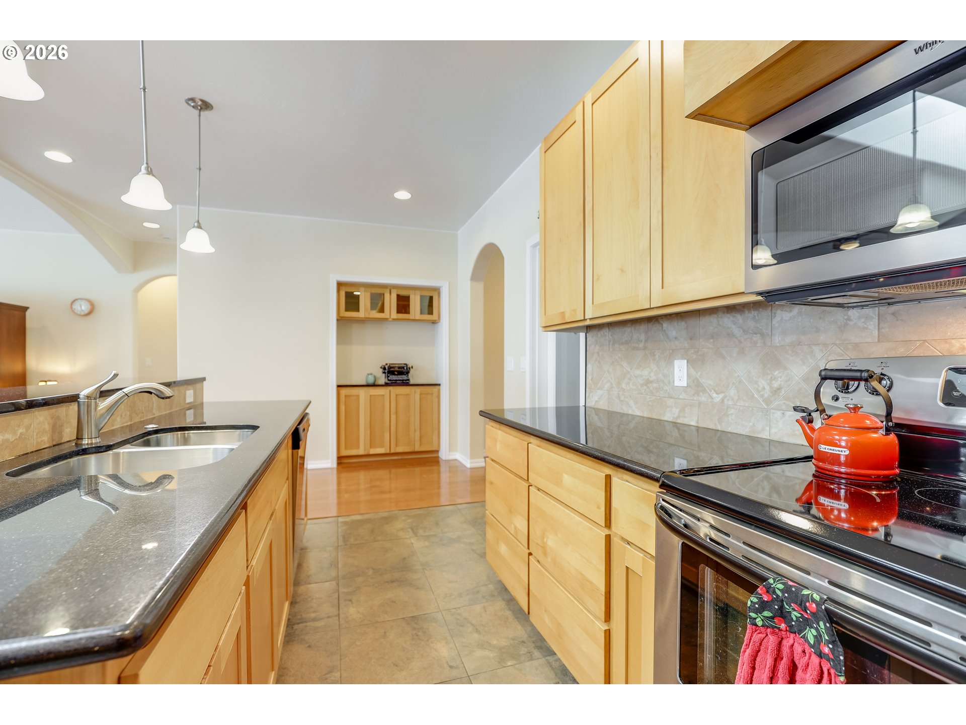 1901 Golden Way The Dalles, OR 97058 - Photo 25 of 48 a kitchen with stainless steel appliances granite countertop a sink and cabinets