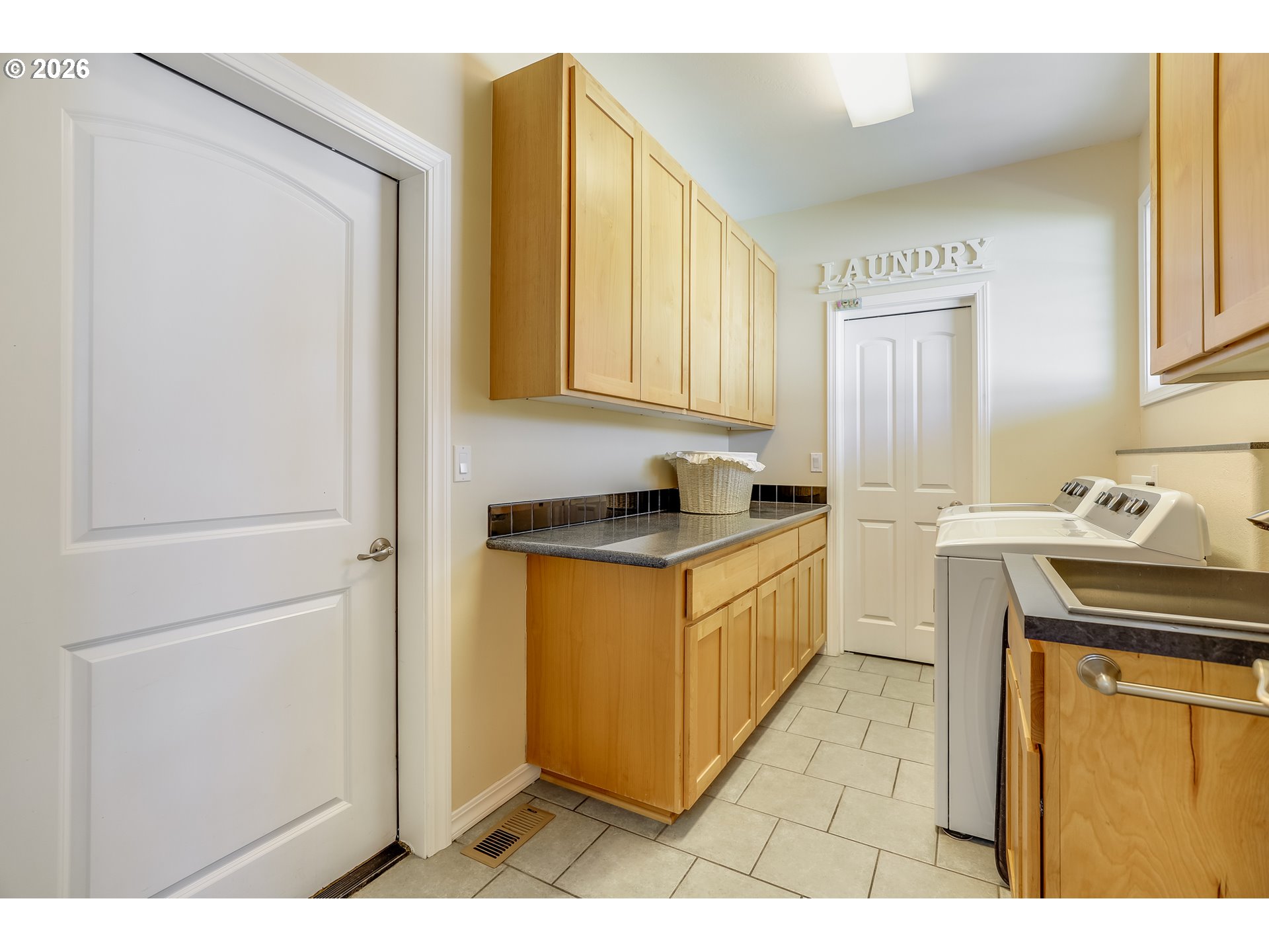 1901 Golden Way The Dalles, OR 97058 - Photo 28 of 48 a kitchen with stainless steel appliances granite countertop a sink a stove a refrigerator a cabinets and a window