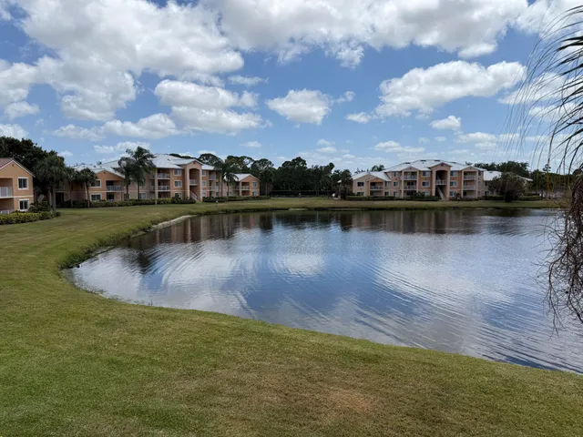a view of a lake with a city