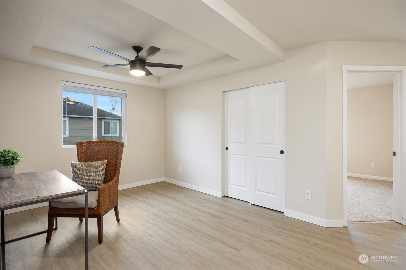 320 Graham Avenue Northeast Renton, WA 98059 - Photo 18 of 26 a dining room with furniture a window and wooden floor
