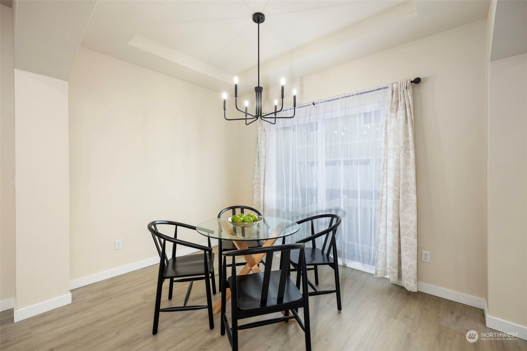 320 Graham Avenue Northeast Renton, WA 98059 - Photo 7 of 26 a view of a dining room with furniture window and wooden floor