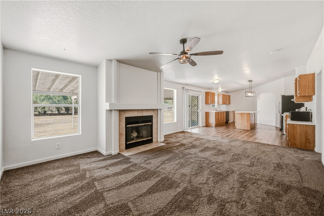1890 West Dyer Road Pahrump, NV 89048 - Photo 23 of 40 This inviting space combines comfort and functionality, perfect for daily living and entertaining.