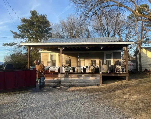 a view of a chairs and tables in the patio