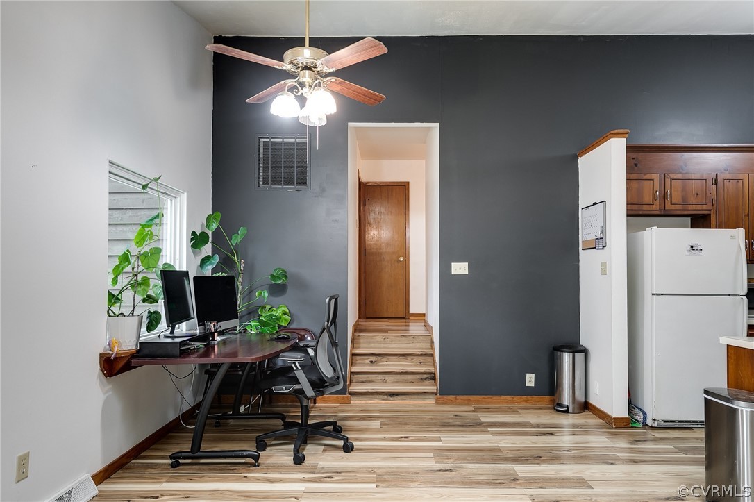 7413 Drexelbrook Road Chesterfield, VA 23832 - Photo 11 of 19 a view of a workspace with furniture and a potted plant