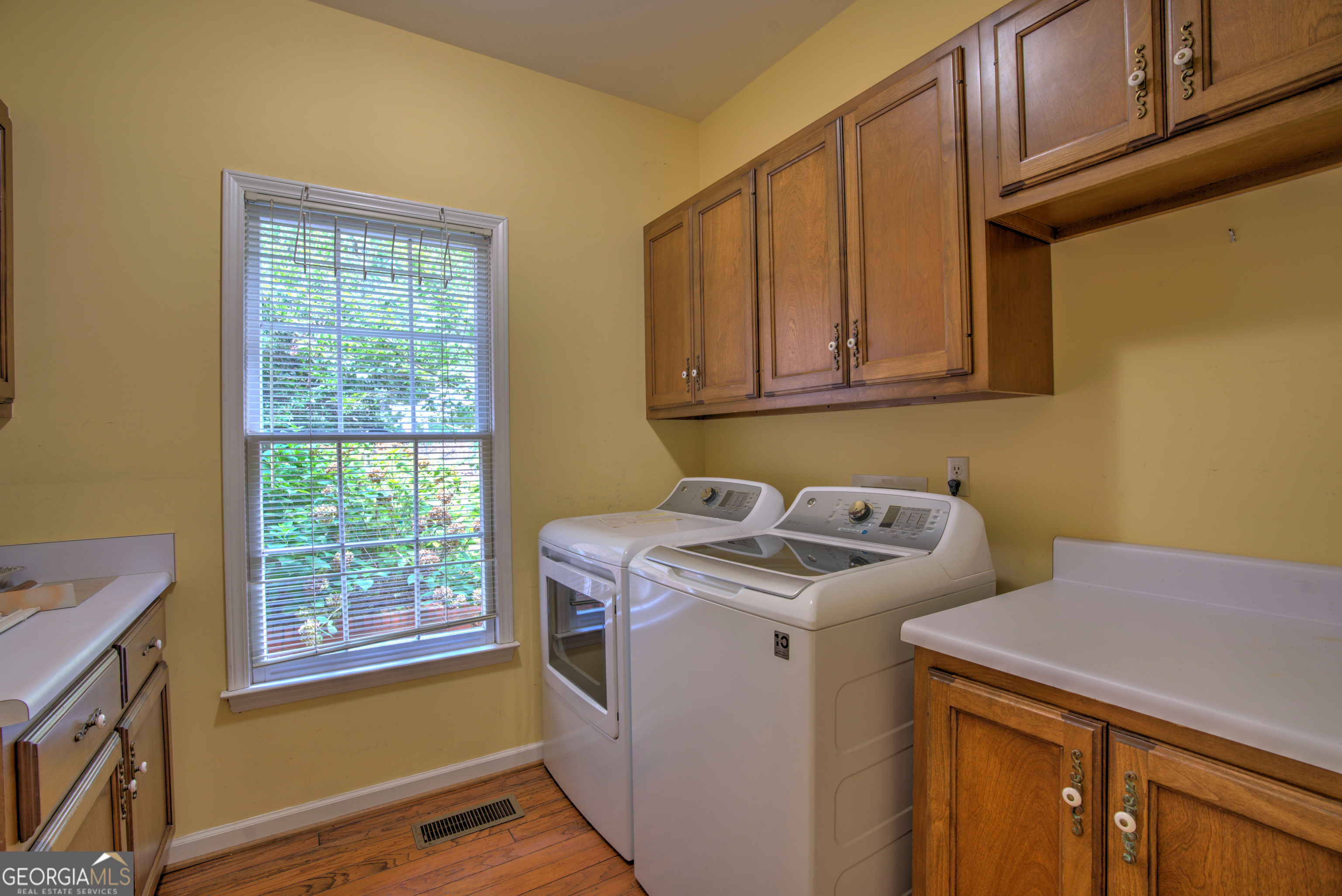 15 Ladonna Place Southwest Rome, GA 30165 - Photo 15 of 70 a utility room with dryer and washer