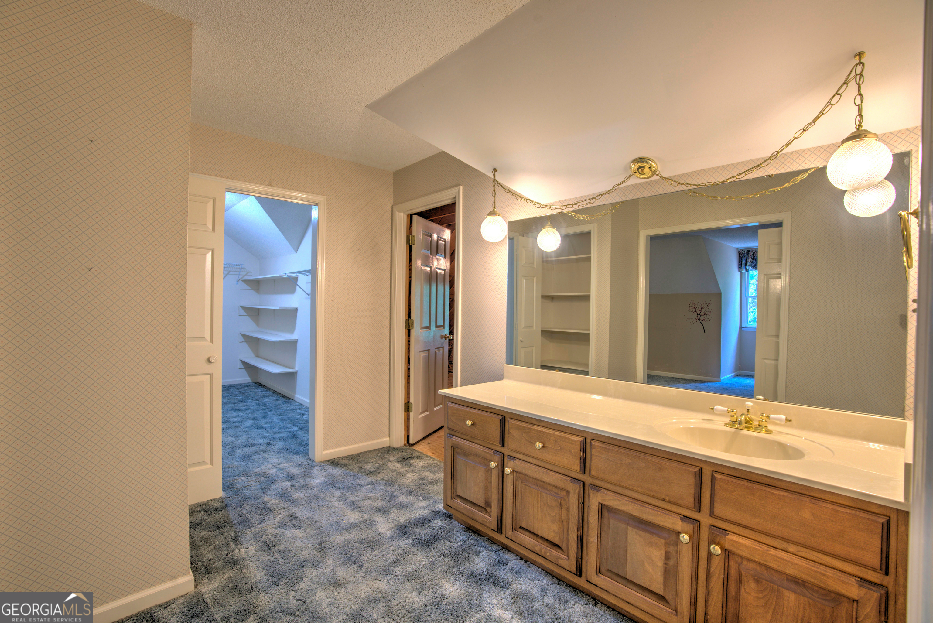 15 Ladonna Place Southwest Rome, GA 30165 - Photo 29 of 70 a bathroom with a double vanity sink and a mirror