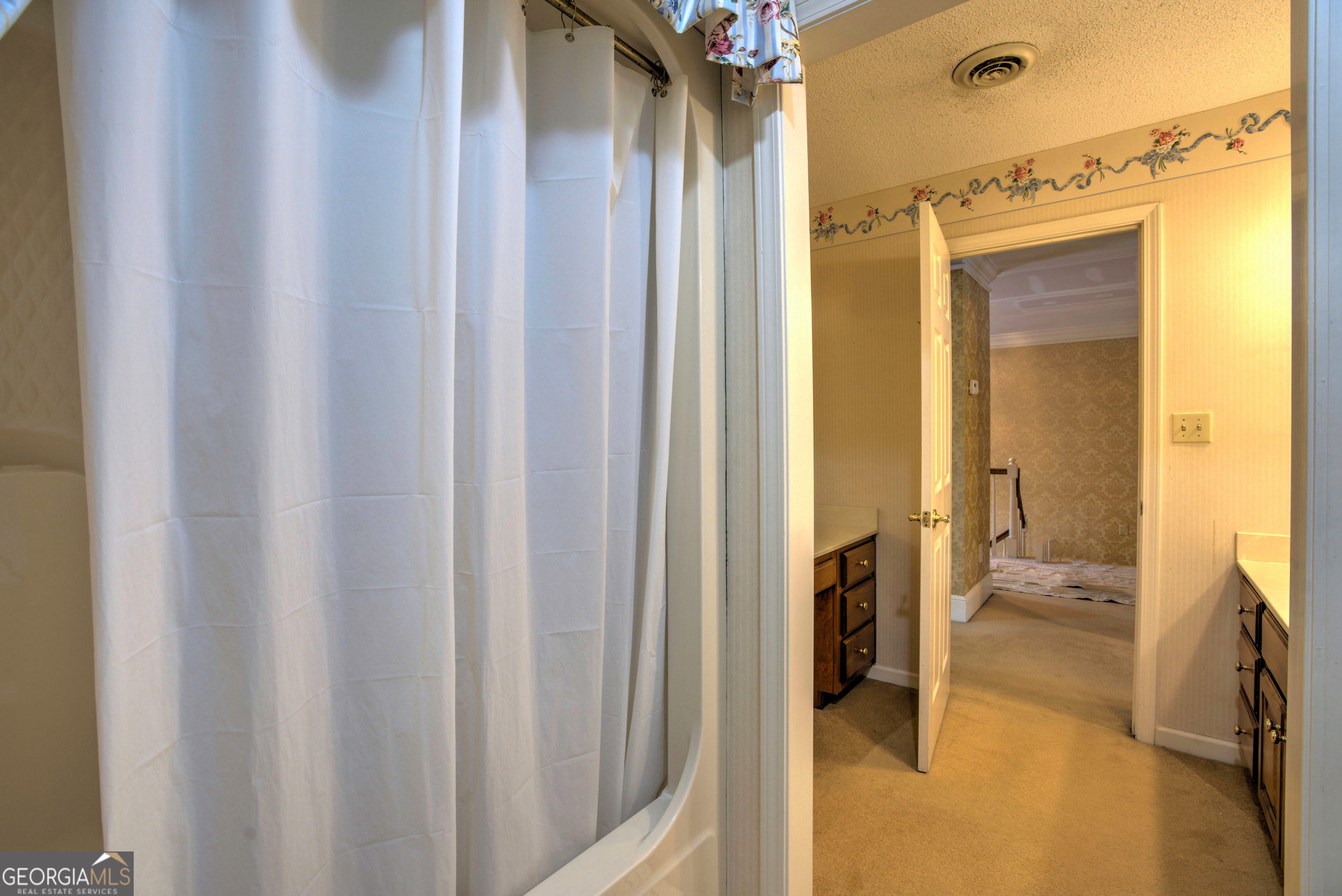 15 Ladonna Place Southwest Rome, GA 30165 - Photo 38 of 70 a view of a bathroom from a hallway