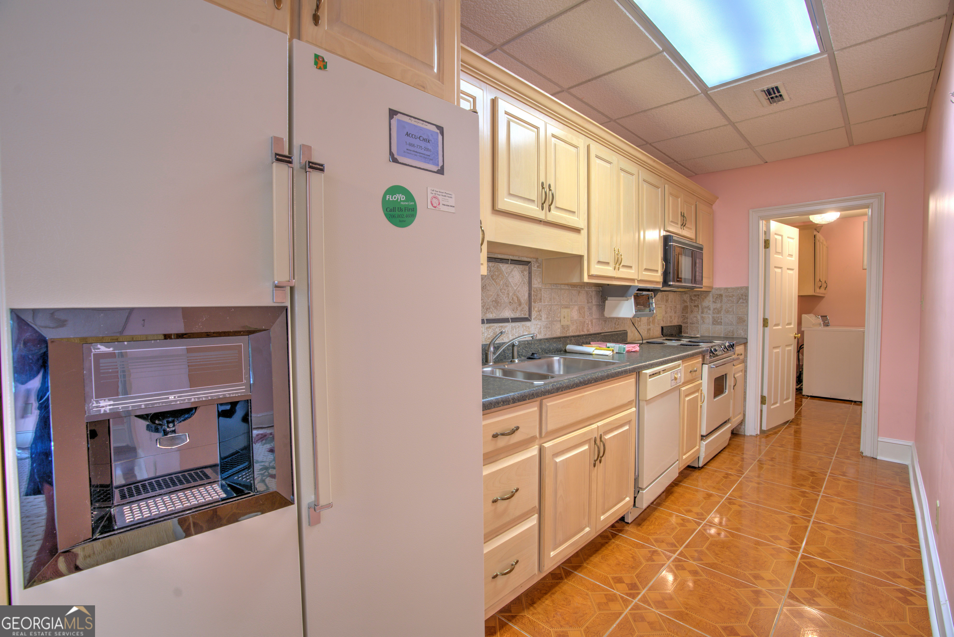 15 Ladonna Place Southwest Rome, GA 30165 - Photo 44 of 70 a large kitchen with stainless steel appliances granite countertop a refrigerator and a stove