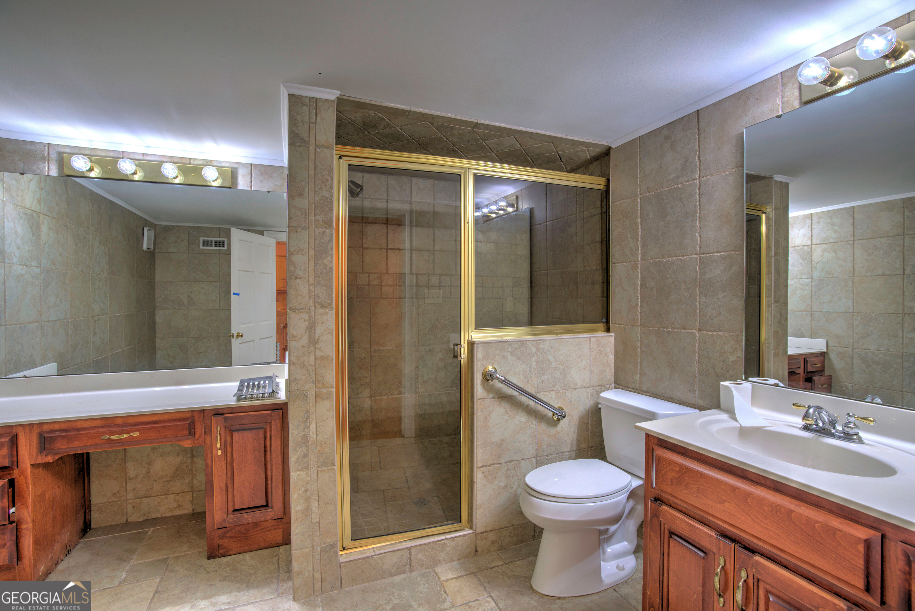 15 Ladonna Place Southwest Rome, GA 30165 - Photo 47 of 70 a bathroom with a sink a toilet and shower