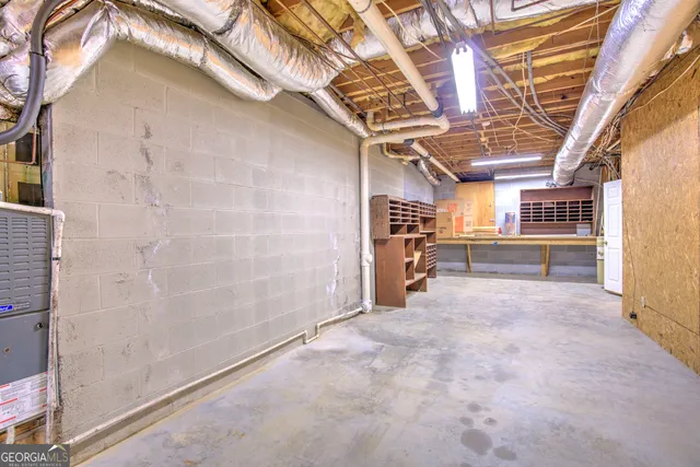 a front view of a house with a yard and a garage