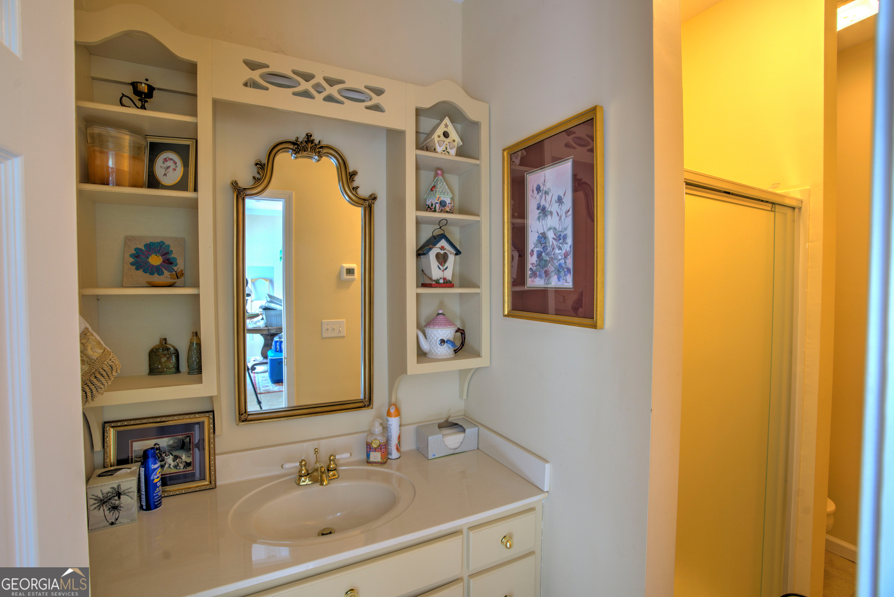 15 Ladonna Place Southwest Rome, GA 30165 - Photo 57 of 70 a bathroom with a sink mirror and window