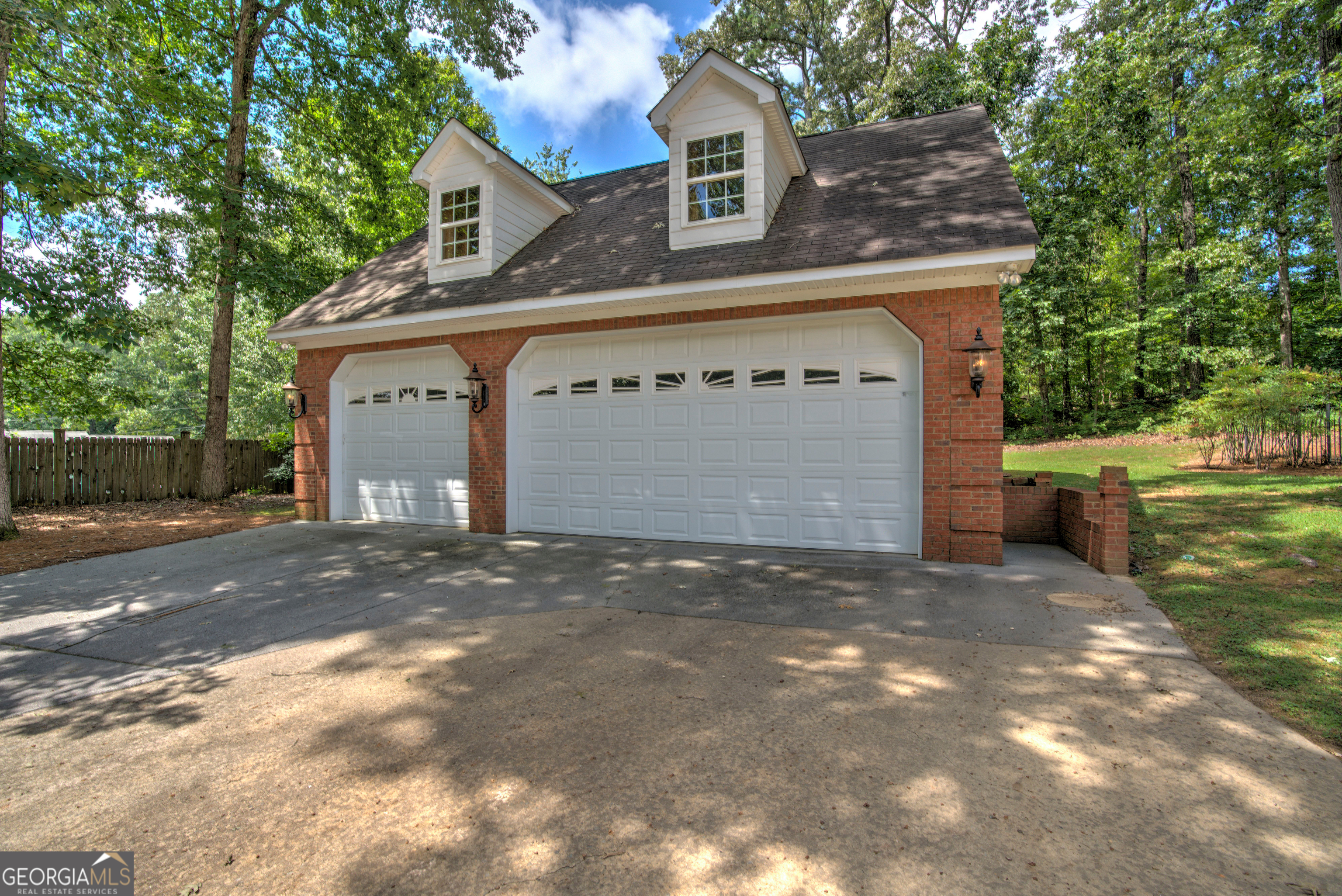 15 Ladonna Place Southwest Rome, GA 30165 - Photo 60 of 70 a front view of a house with a yard and garage