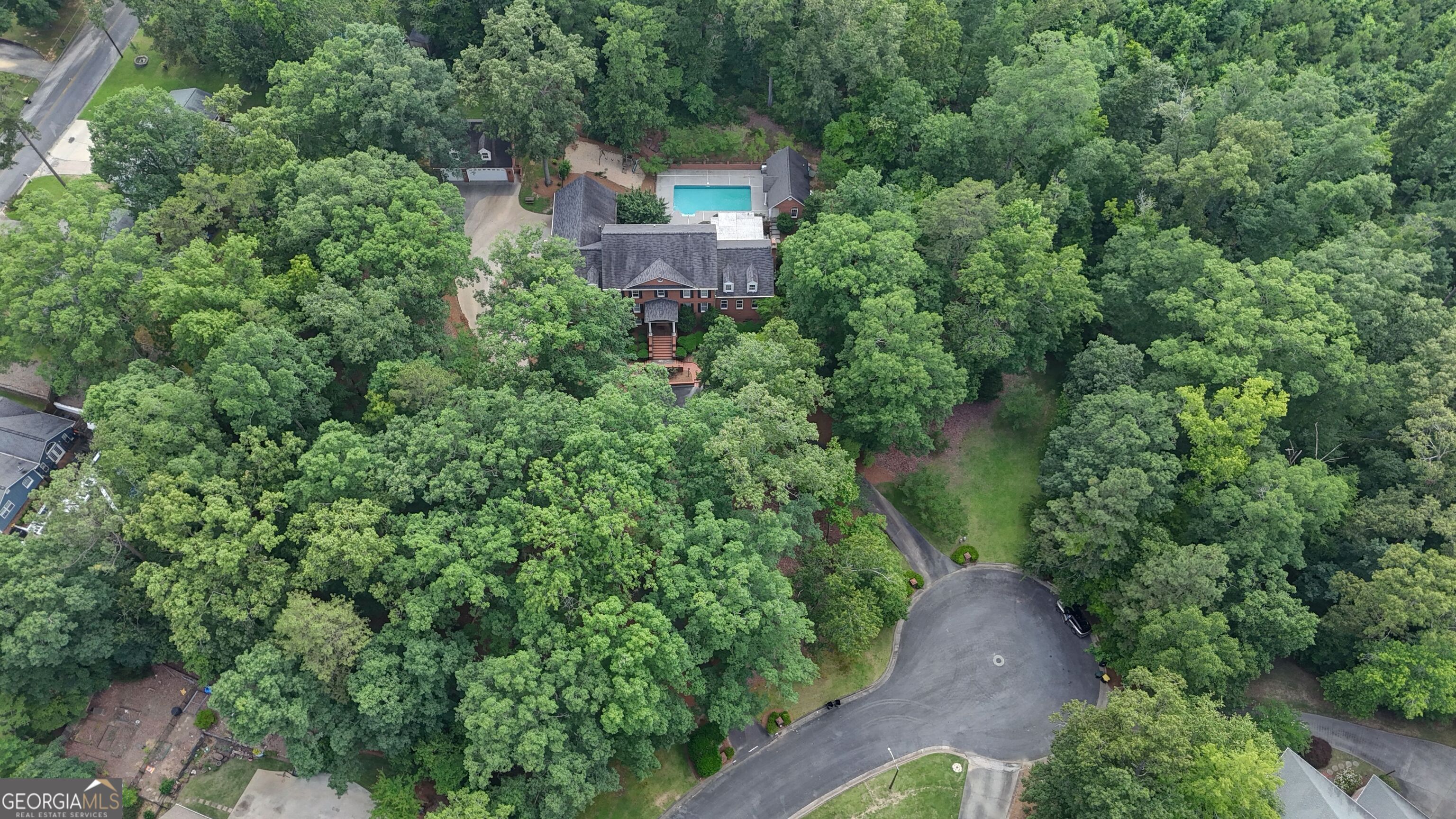 15 Ladonna Place Southwest Rome, GA 30165 - Photo 66 of 70 an aerial view of a house with swimming pool and garden