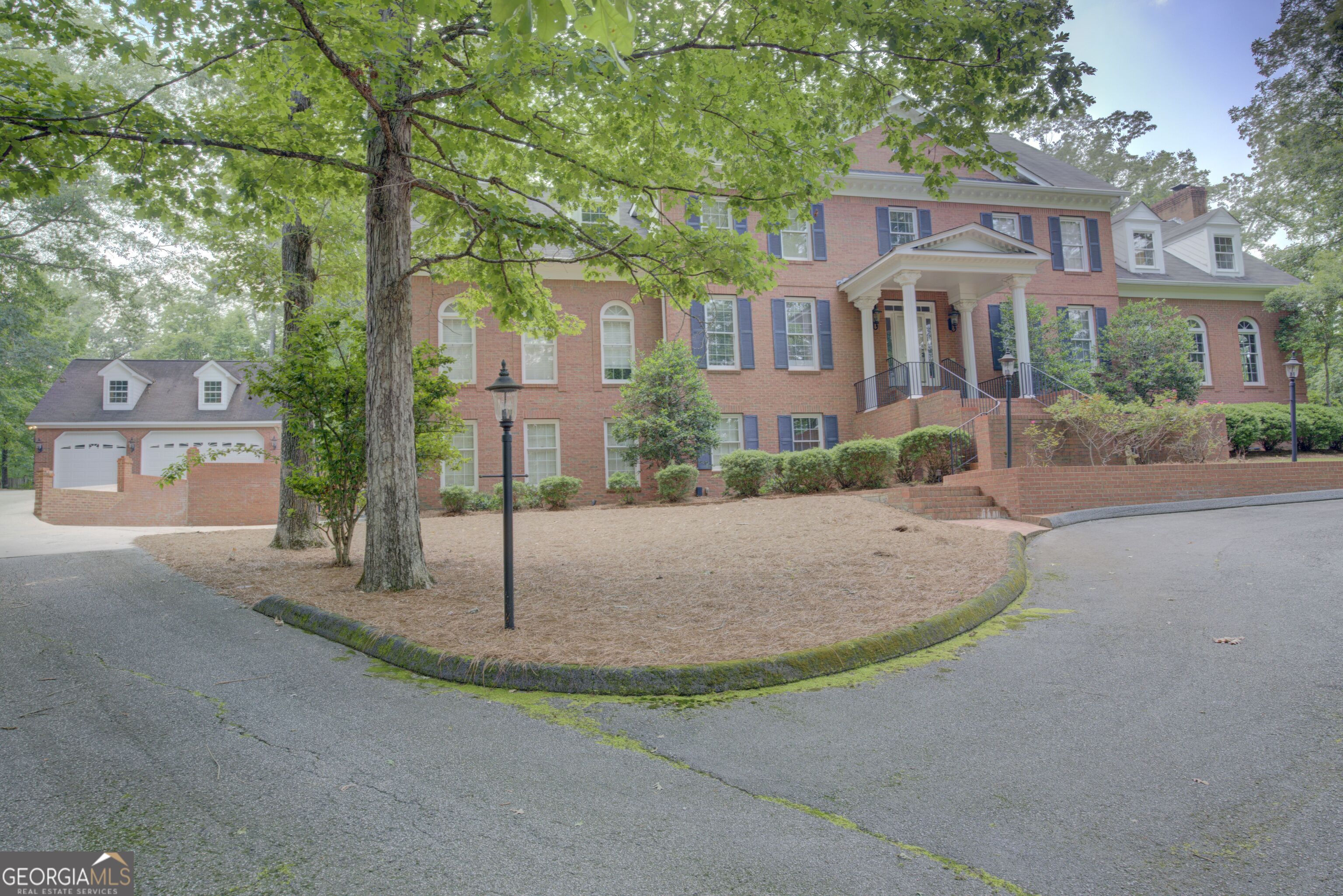 15 Ladonna Place Southwest Rome, GA 30165 - Photo 70 of 70 a view of a brick house with a yard and large tree