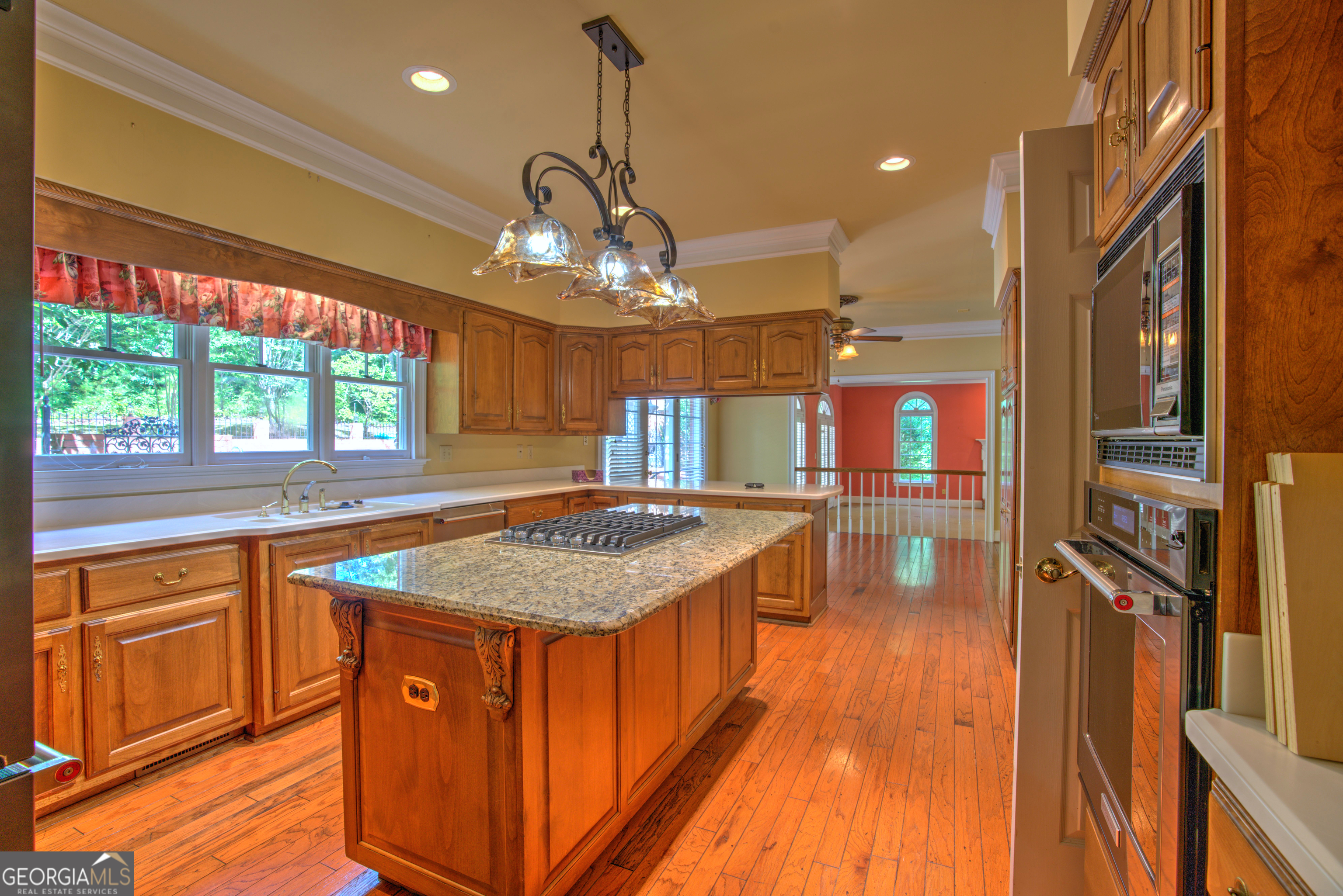 15 Ladonna Place Southwest Rome, GA 30165 - Photo 10 of 70 a kitchen with stainless steel appliances granite countertop wooden floors and sink